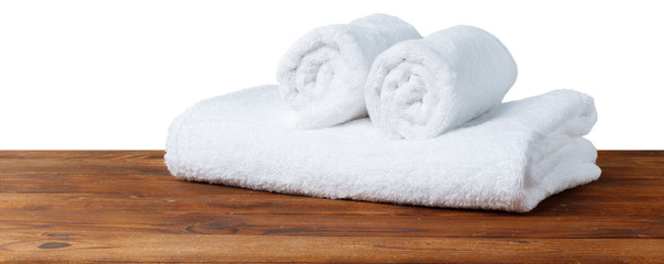 Obraz na płótnie Canvas white spa towels on the table