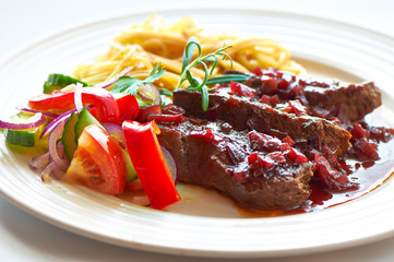 Beef in red wine sauce with pasta