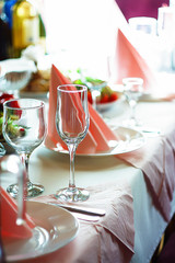 table setting in the restaurant, glasses on the table