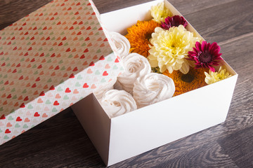 box with white zephyr and sunflowers and chrysanthemums