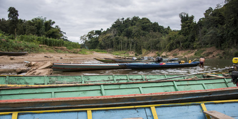 Boats on Nam Khan riverbank, Luang Prabang, Laos