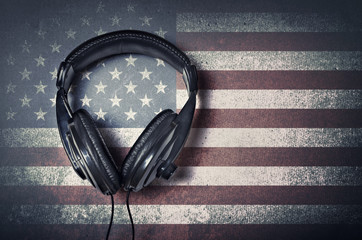 Headphones on grunge American flag background