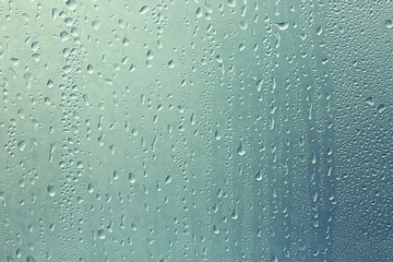 texture of a drop of rain on a glass wet transparent background