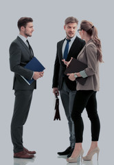 Photo of successful business people working. Isolated on white.