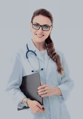 Smiling female doctor in white coat.