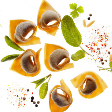 Pattern From Ravioli And Seasonings. Concept Of Italian Cuisine .