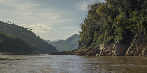 Scenic view of river with mountain range in background, River Mekong, Sainyabuli Province, Laos