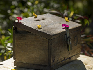 Close-up of donation box, Luang Prabang, Laos