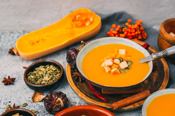 Pumpkin soup with pumpkin seeds in bowl