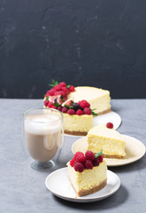 Cheesecake with raspberries and figs on a gray background, raspberry, berries, cake, vertical, selective focus, sweets
