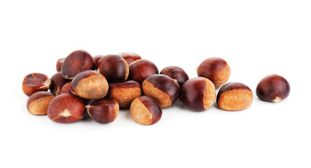 Fresh raw chestnuts on the white background