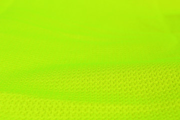 Green textile with a fold on focus