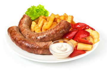 grilled sausages with potatoes fries solated on white background