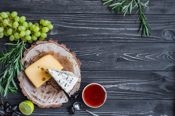cheeses on wood are chopped deliciously and nutritionally