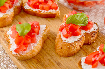 bruschetta with tomato on table