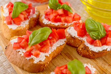 bruschetta with tomato on table