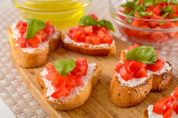 bruschetta with tomato on table