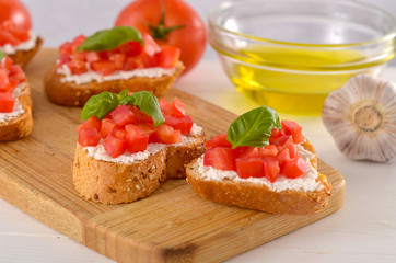bruschetta with tomato on table