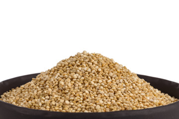 Pile of grain quinoa seeds in bowl
