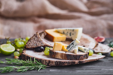 cheeses on wood are chopped deliciously and nutritionally