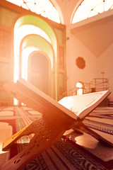 Fototapeta na wymiar Quran in the mosque - open for prayers