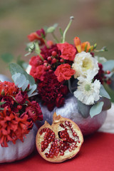 autumnal floristic decor on the street wedding table setting
