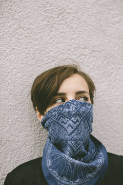 tomboy covered face with blue headscarf