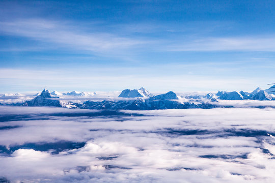 Himalayan ranges seen from a mountain flight in Nepal. - Powered by Adobe