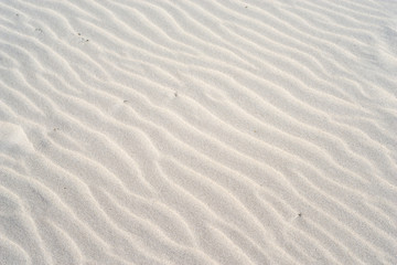 Fototapeta na wymiar Wellen im Sand