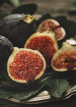 Fresh figs on wooden table