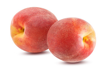 Two fresh peaches isolated on white background with clipping path