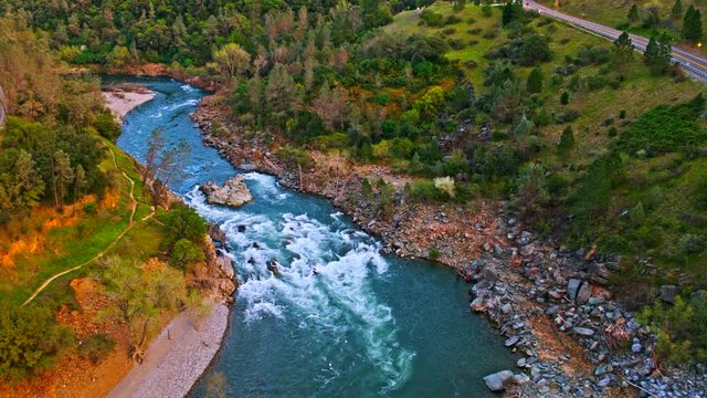 Aerial of American river near Foresthill, Auburn-Foresthill or Auburn road bridge crossing over the North Fork American River in Placer County and the Sierra Nevada foothills, in eastern California. 