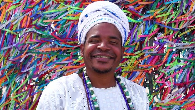 Portrait of Candomble priest Woman at Bonfim Church in Salvador, Bahia, Brazil