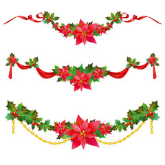Christmas garland with poinsettia and red ribbons ,iaolated on a white