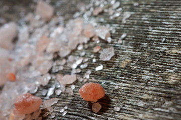 Himalayan salt on old wooden table