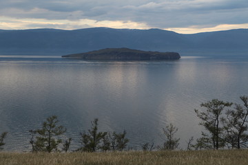Fototapeta na wymiar an evening view of Baikal lake and surrounding mountains; Olkhon island, Russia