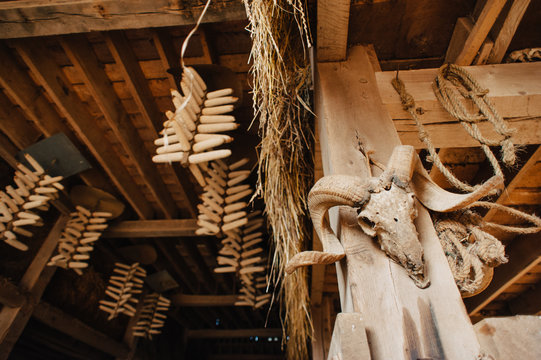 The inside of an old rustic barn on a working farm