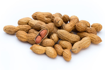 Dried peanuts on the white background.