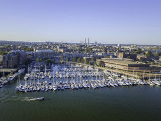 Pier of Boston Massachusetts USA, Wharf with sailboat and yachts in Charles Rive, skyline skyscrapers