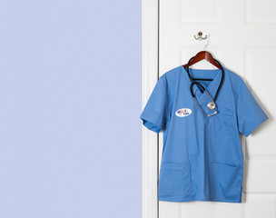 Blue scrubs shirt for medical professional who votes in election