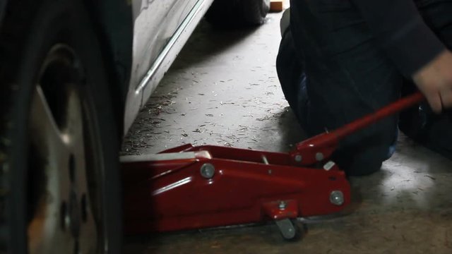 jacking up a car 2