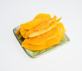 Dried Mango or Dried Mango slices on a background.