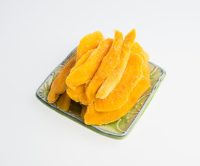 Naklejka na ściany i meble Dried Mango or Dried Mango slices on a background.