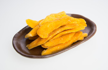 Dried Mango or Dried Mango slices on a background.