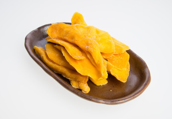 Dried Mango or Dried Mango slices on a background.