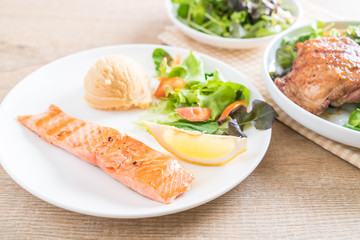 grilled salmon steak with mash potato and vegetable