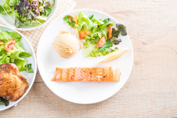 grilled salmon steak with mash potato and vegetable