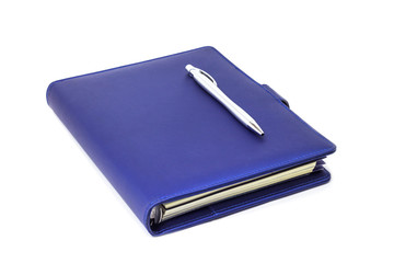 blue diary and pen isolated on and white background