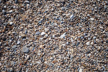 stone beach on the shore of lake Baikal