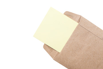 Notepad in the envelope on white background